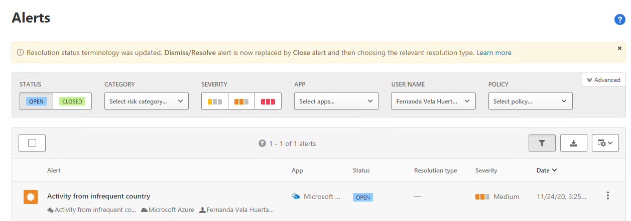 A screenshot of the Alerts page. The administrator is reviewing an alert where the Policy equals Activity from an infrequent country.