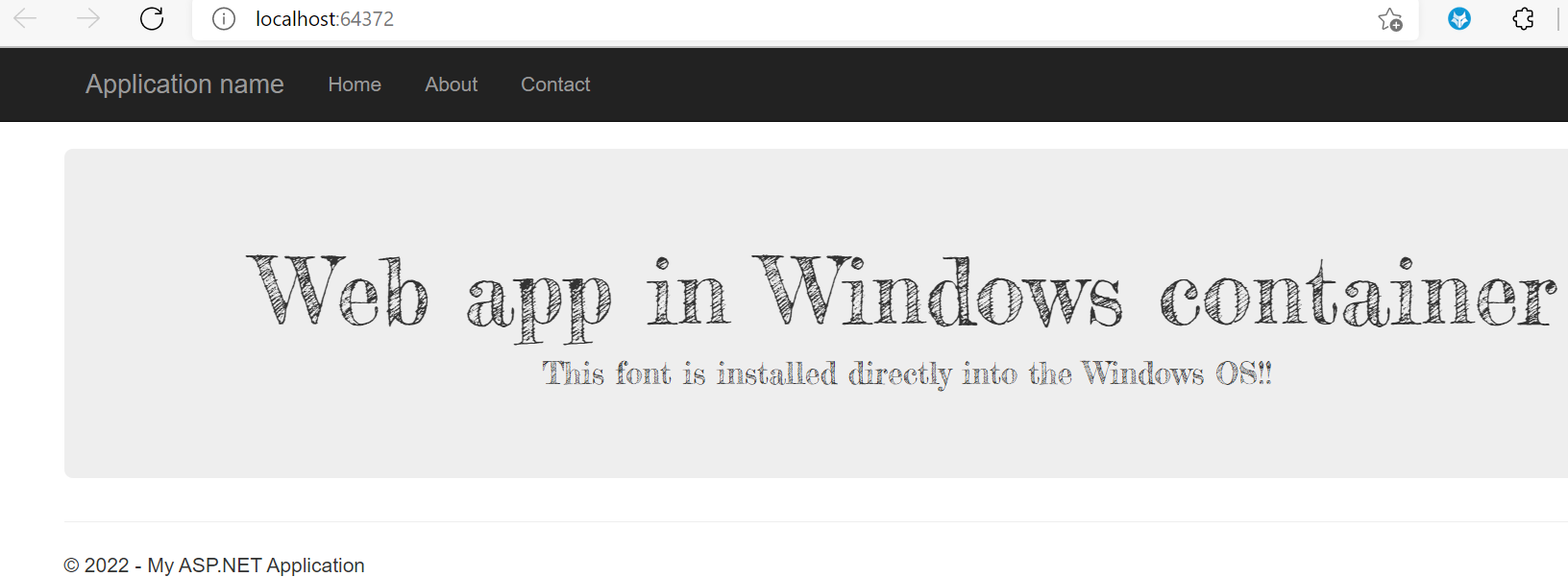 Zobrazuje webovou aplikaci spuštěnou v kontejneru Windows.