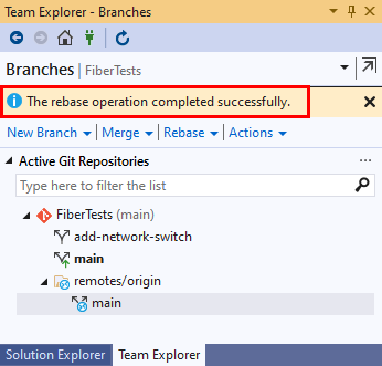 Screenshot of the rebase confirmation message in the Branches view of Team Explorer in Visual Studio 2019.