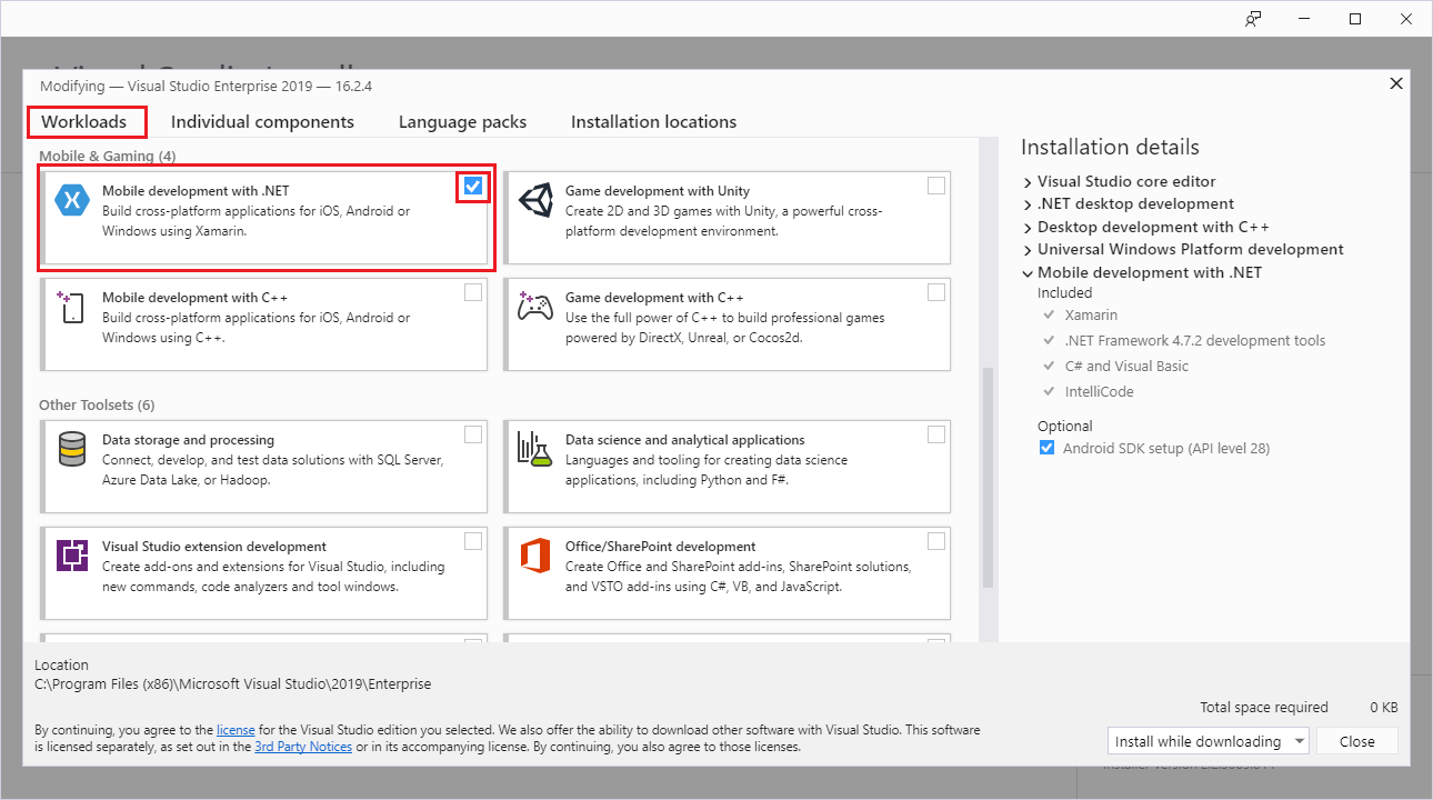 Screenshot that shows the Workloads tab, Modifying dialog box, and Visual Studio Installer