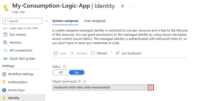 Screenshot showing the Consumption logic app "Identity" pane with the "System assigned" tab selected.