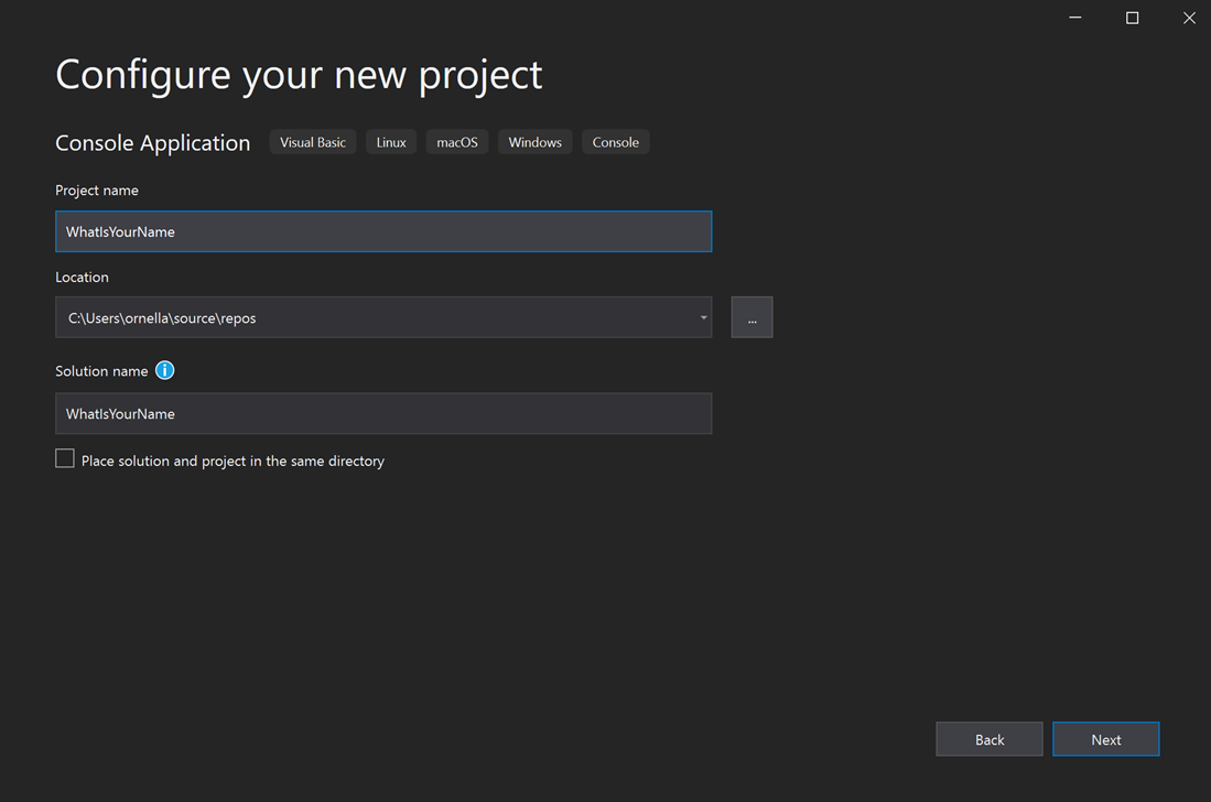 Screenshot showing the 'Configure your new project' window with the Project name field set to'WhatIsYourName'.