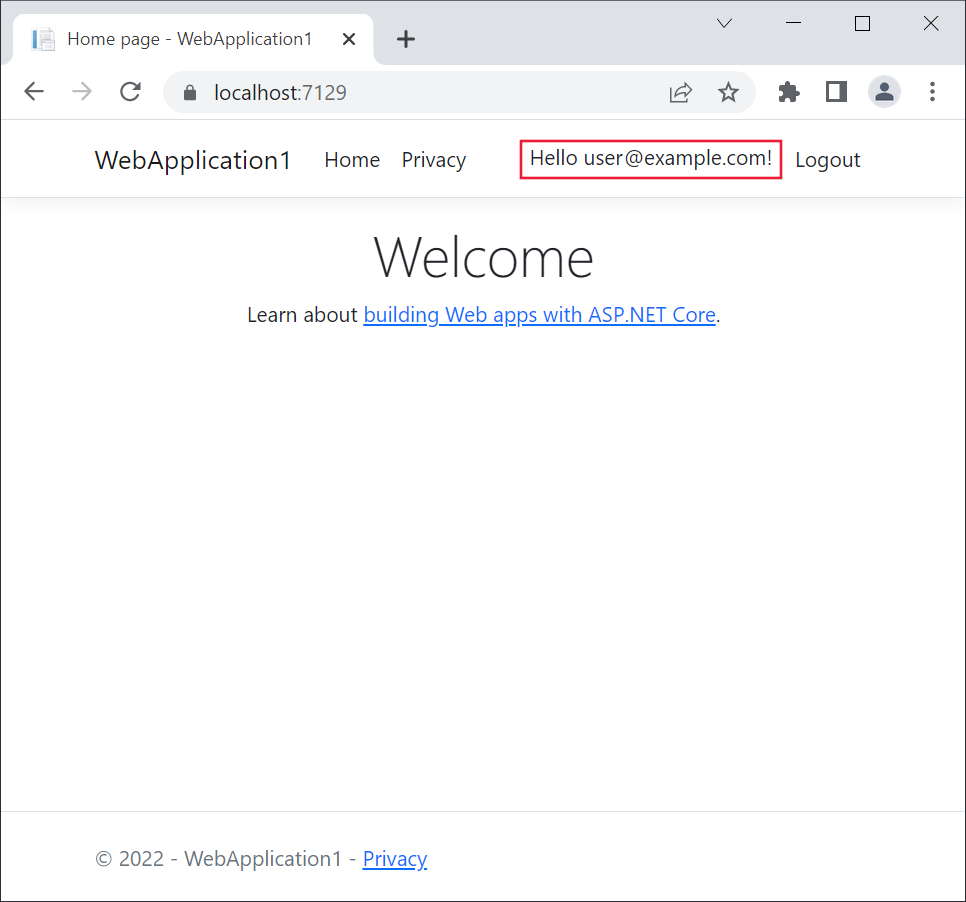 Web application open in Microsoft Edge. The Register link is replaced by the text Hello user1@example.com!