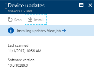 In the Device updates pane, there is a link labelled "Installing updates. View Job". The Install button is highlighted.