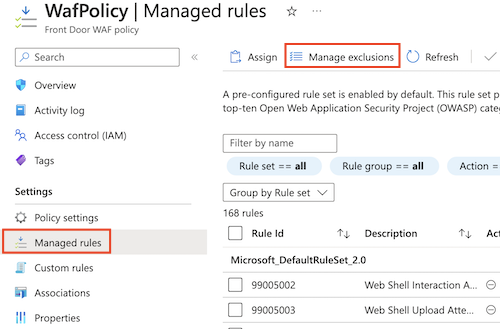 Screenshot that shows the Azure portal showing the WAF policy's Managed rules page, with the Manage exclusions button highlighted.
