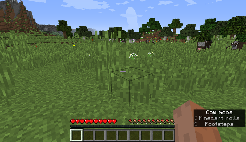 Screenshot of Minecraft showing arrowhead directional cues with environmental sound subtitles.