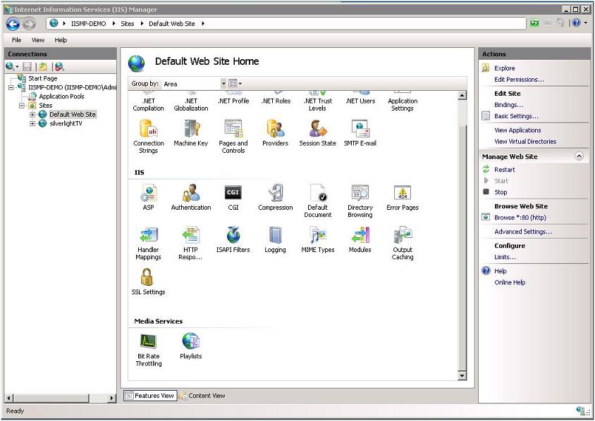 Screenshot of the I I S Manager window showing the Default Web Site feature icons.