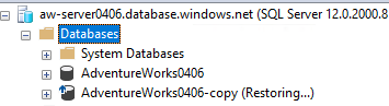 Screenshot that shows a database restoring in SSMS.