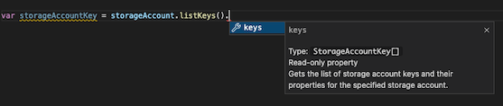 Screenshot of the Bicep extension for Visual Studio Code. IntelliSense displays several the information returned by the listKeys function for a storage account.