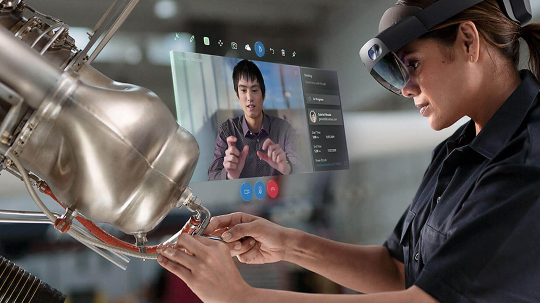 Photo of technician using HoloLens and Remote Assist