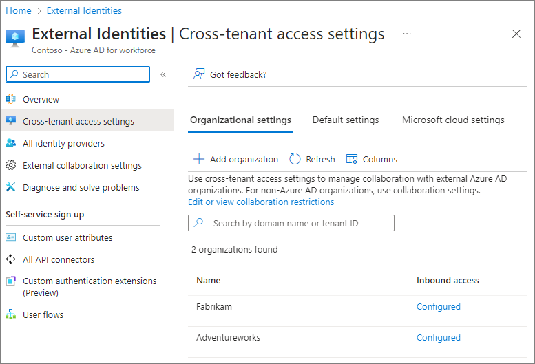Screenshot of cross-tenant access settings in Microsoft Entra ID with two external organizations configured.