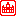 red building with tower sign (city hall)