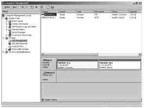 Figure 11-1: Disk Management displays volumes much like partitions.