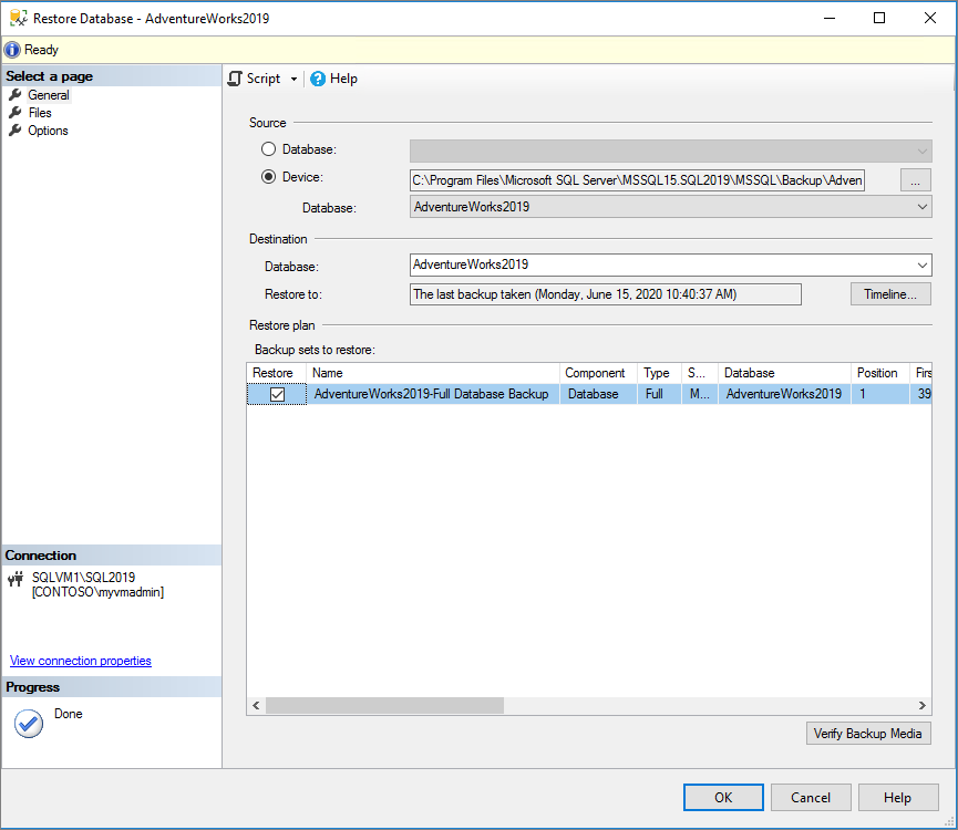 Screenshot showing the Restore Database window with the backup set to restore highlighted and the OK option called out.
