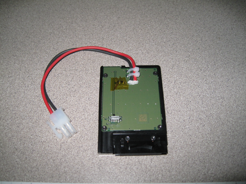 well designed battery blank showing green circuit board in case with black and red leads