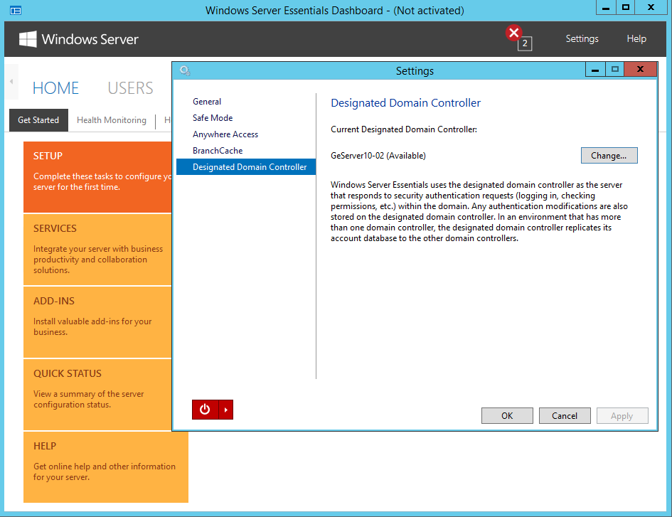 A screenshot showing the Settings control panel in the foreground and the Windows Server Essentials dashboard in the background. The Designated Domain Controller page of the Settings control panel is currently selected.