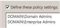 Screenshot of the "User Rights Management" window, showing that the "Define these policy settings" checkbox is selected and two domain accounts are being denied local sign-in.