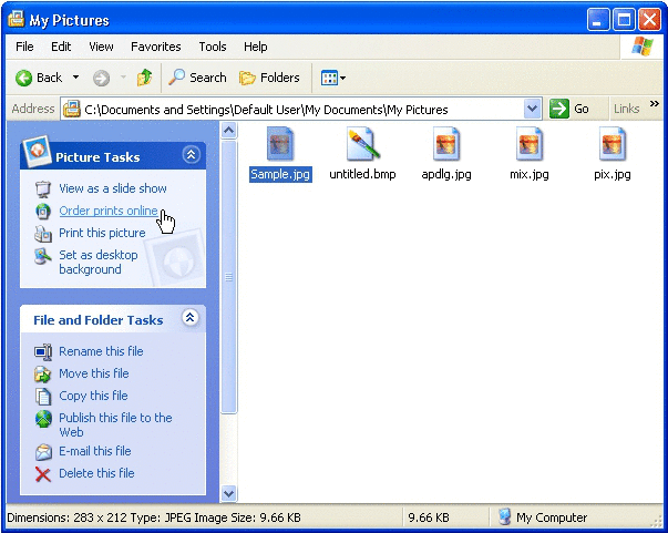 Capture d'écran de l'Explorateur Windows, où une souris survole le bouton de commande d'impressions en ligne