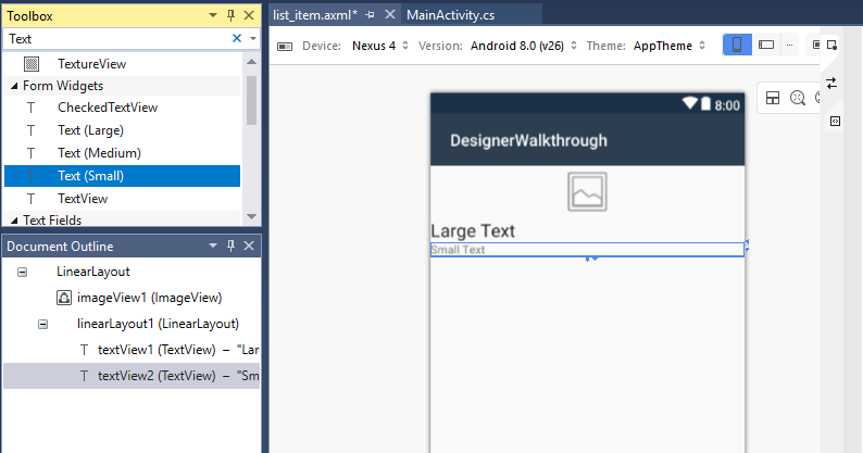Screenshot shows the Designer surface with Toolbox, Document Outline, and layout area with small text selected.