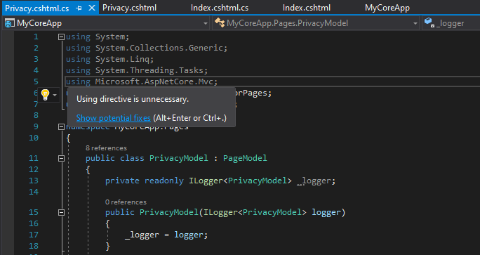 Captura de pantalla en la que se muestra el archivo Privacy.cshtml en el editor de código de Visual Studio con el cuadro de diálogo "Eliminar instrucciones Using innecesarias" abierto.