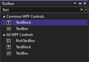 Captura de pantalla de la ventana Cuadro de herramientas con el control TextBlock seleccionado en la lista de controles WPF comunes.