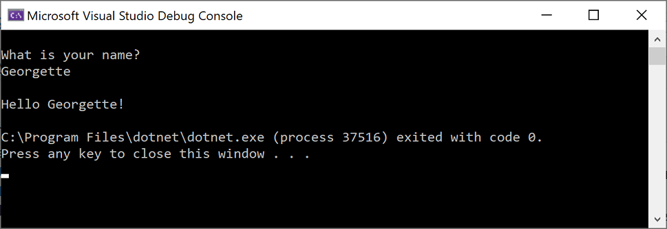 Captura de pantalla de la ventana de la Consola de depuración de Microsoft Visual Studio en la que se muestra el mensaje de solicitud de un nombre, la entrada y la salida "Hello Georgette!" (Hola, Georgette).