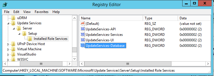 Screenshot of the Registry Editor dialog box showing the key name update to UpdateServices-Database.