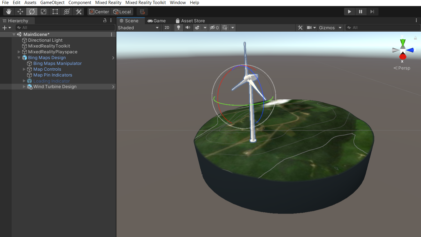 Screenshot of the Unity hierarchy window with the main scene selected and the wind turbine design child object expanded. Rotate tool is also selected.