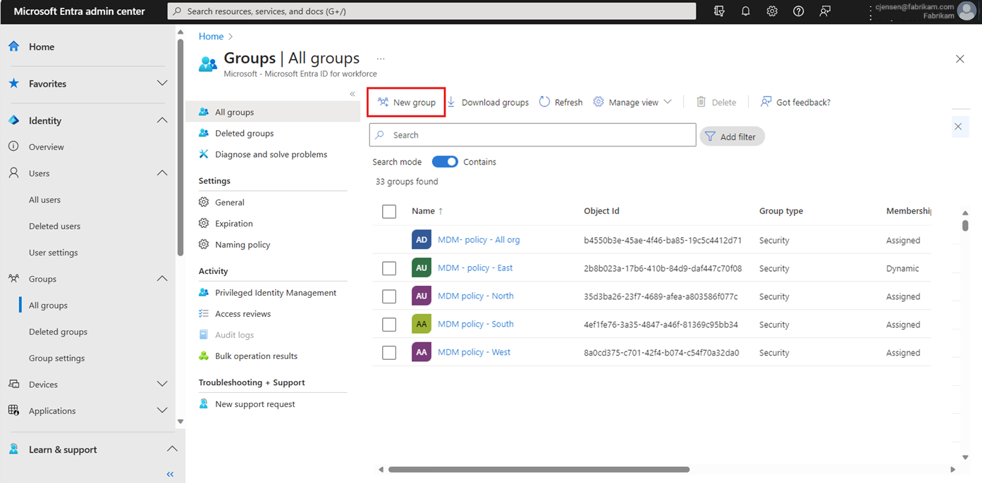 Cuplikan layar halaman 'Grup Microsoft Entra' dengan opsi 'Grup baru' disorot.