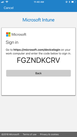 Instructions are provided to go to the https://microsoft.com/devicelogin page, with a unique passcode, from your work computer, then to use the code to sign in.