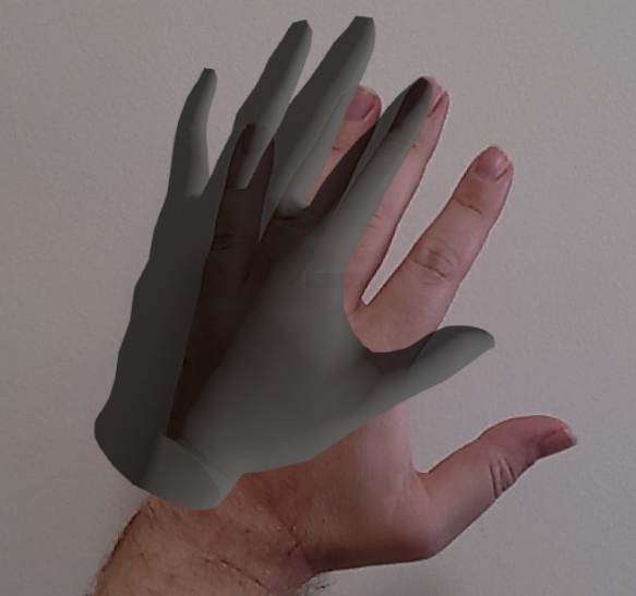 실제 인간의 손에 오버레이된 디지털 손의 이미지