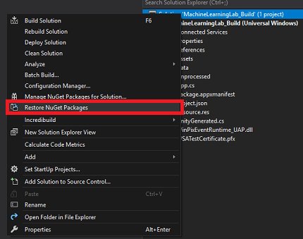 Zrzut ekranu przedstawiający okno programu Visual Studio z wyróżnionym elementem menu Przywróć pakiety Nu Get.