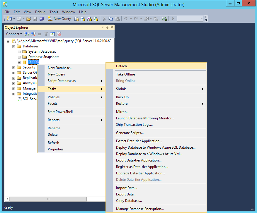Screenshot of SQL Server Management Studio showing the SUSDB > Tasks > Detach option selected.