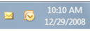 captura de tela da área de notificação e dos ícones do Outlook 