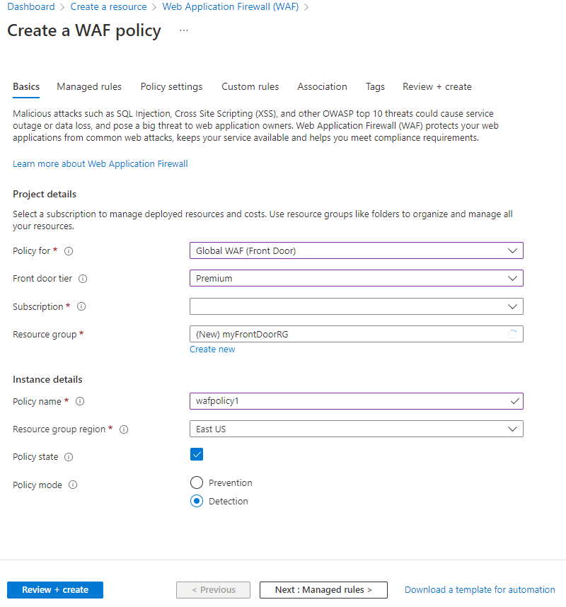 Captura de ecrã a mostrar a página Criar uma política W A F, com as caixas de lista e botão Rever + criar para a subscrição, grupo de recursos e nome da política.