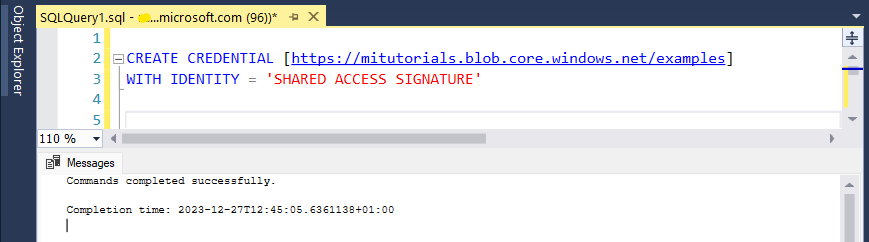 Screenshot that shows the SSMS Query Editor. The CREATE CREDENTIAL statement is visible, and a message indicates that the query ran successfully.