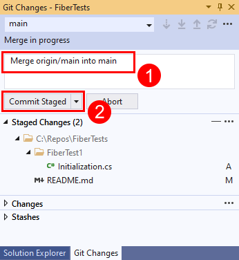 Skärmbild av incheckningsmeddelandet och knappen Genomför stegvis i fönstret Git-ändringar i Visual Studio.