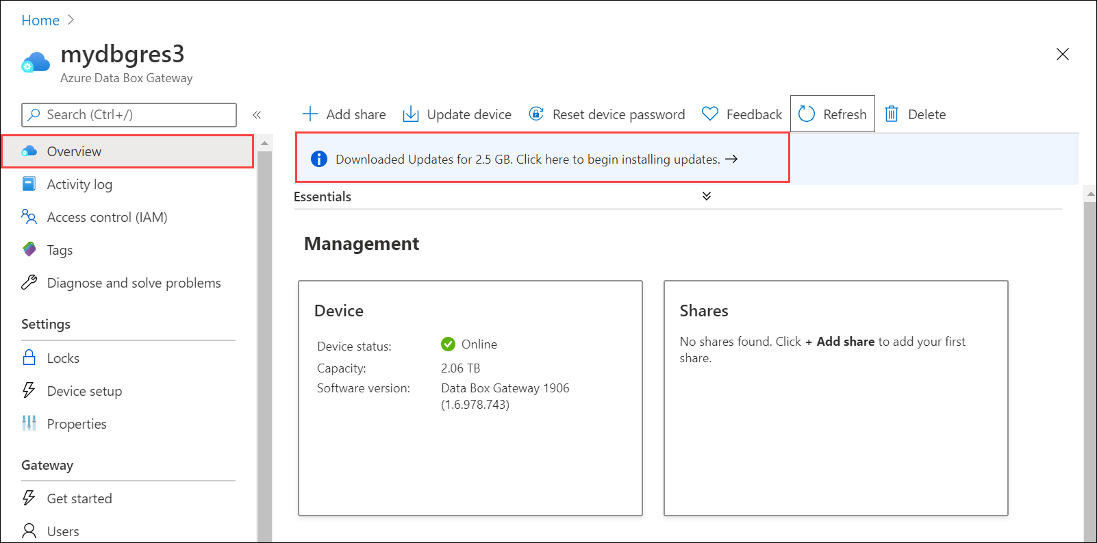 Screenshot of the Azure Data Box Gateway Home page with the Overview option and the Downloaded Updates notification banner called out.