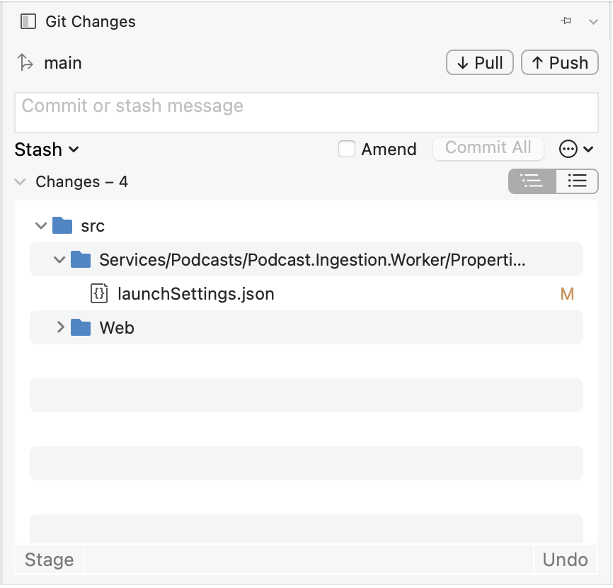 Screenshot of the Git Changes window in Visual Studio for Mac, with a launchSettings.json file displayed in the list of Staged files.